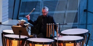 Jeremy playing the timpani