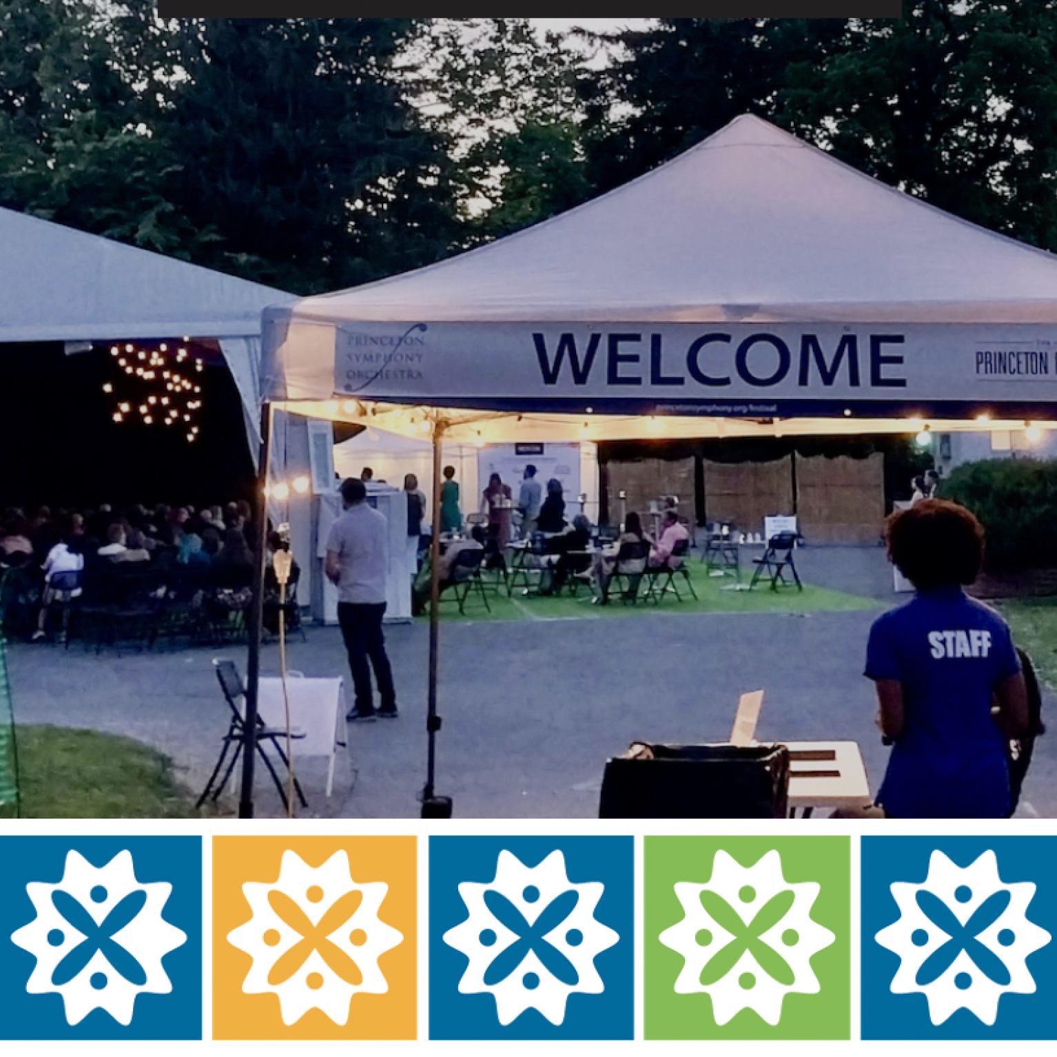 Festival Welcome Tent with tile design along the bottom