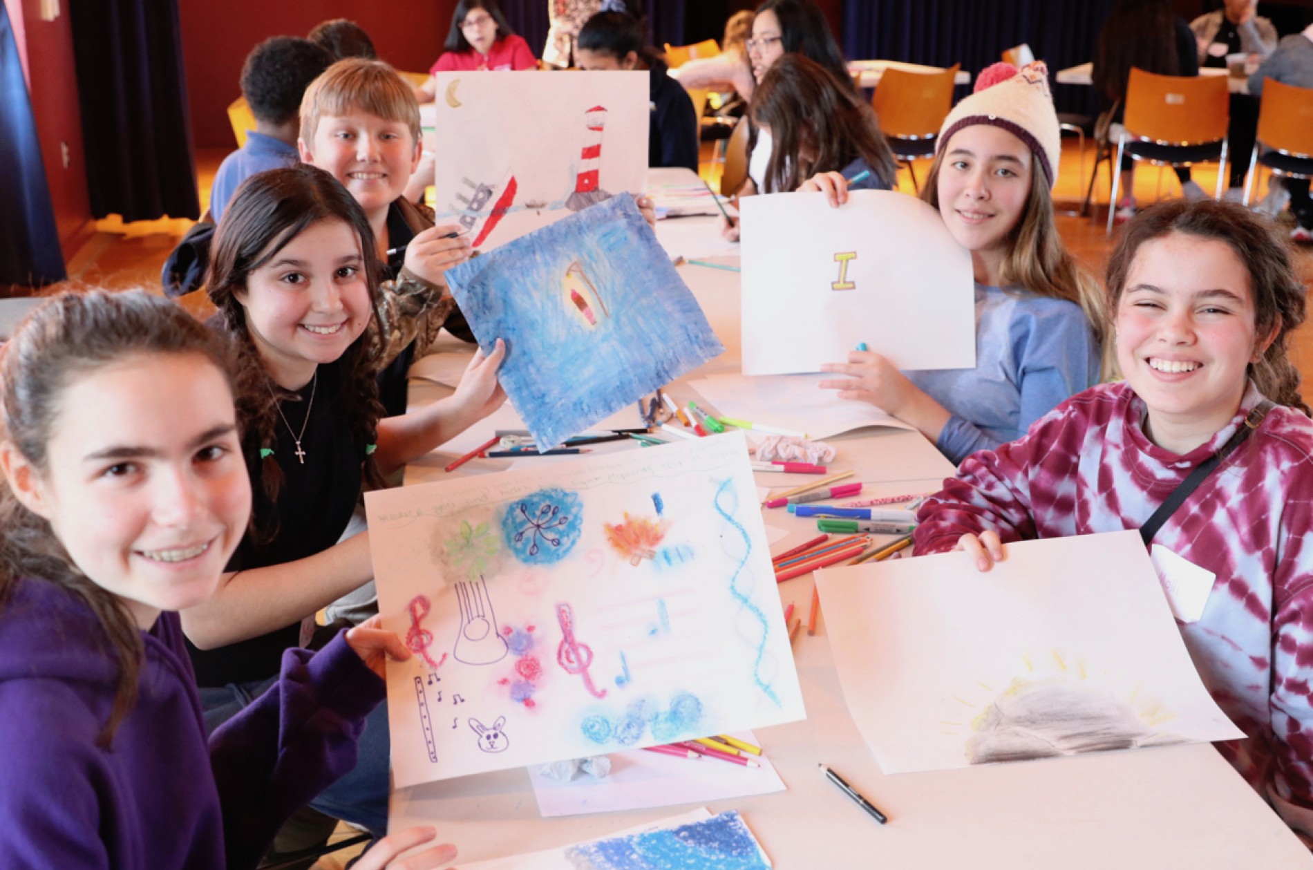 Listen Up! students creating art at a workshop