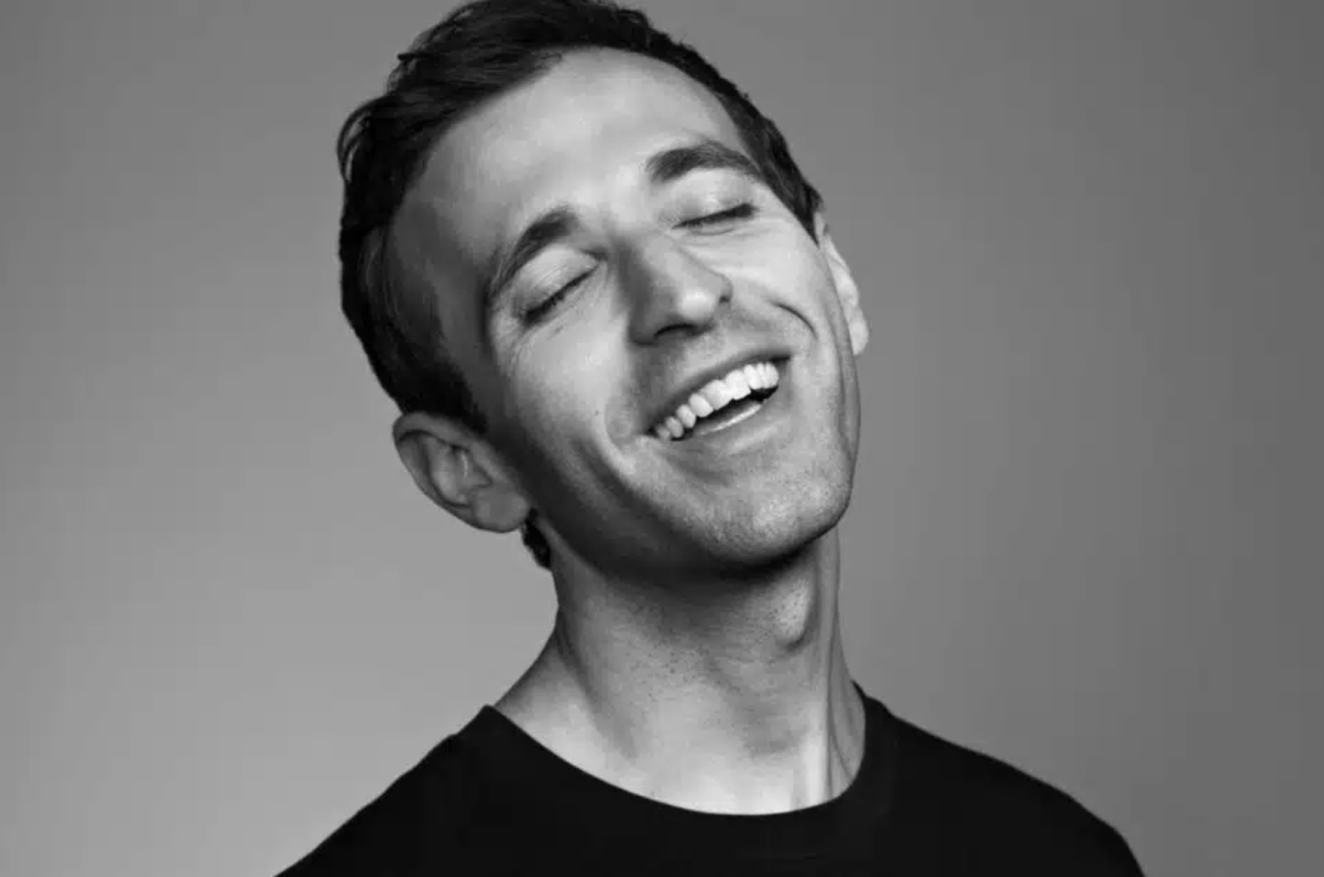 Anthony Roth Costanzo, countertenor, singing in a black t-shirt against a gray backdrop.