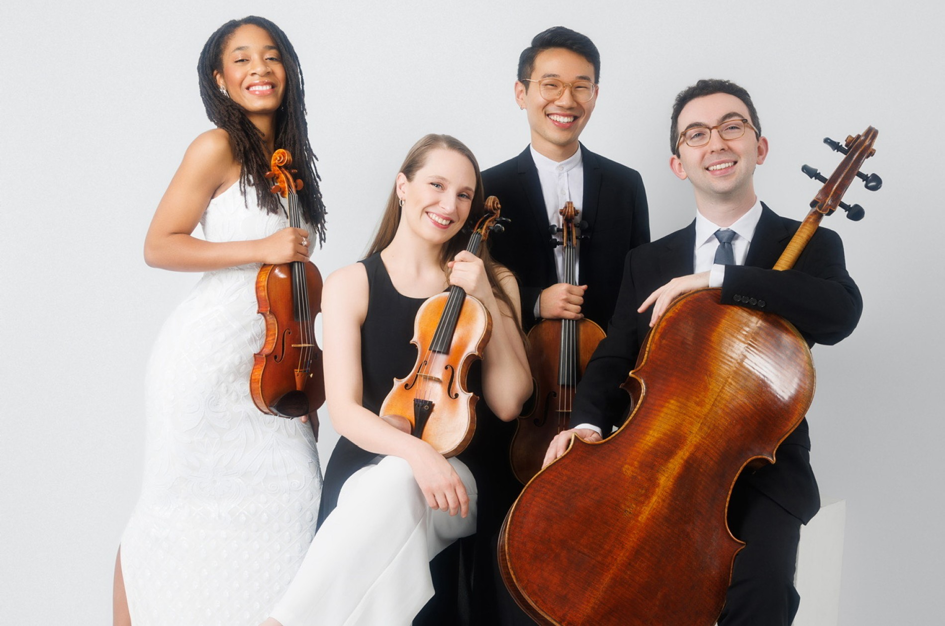Members of a string quartet with their instruments; Abeo Quartet