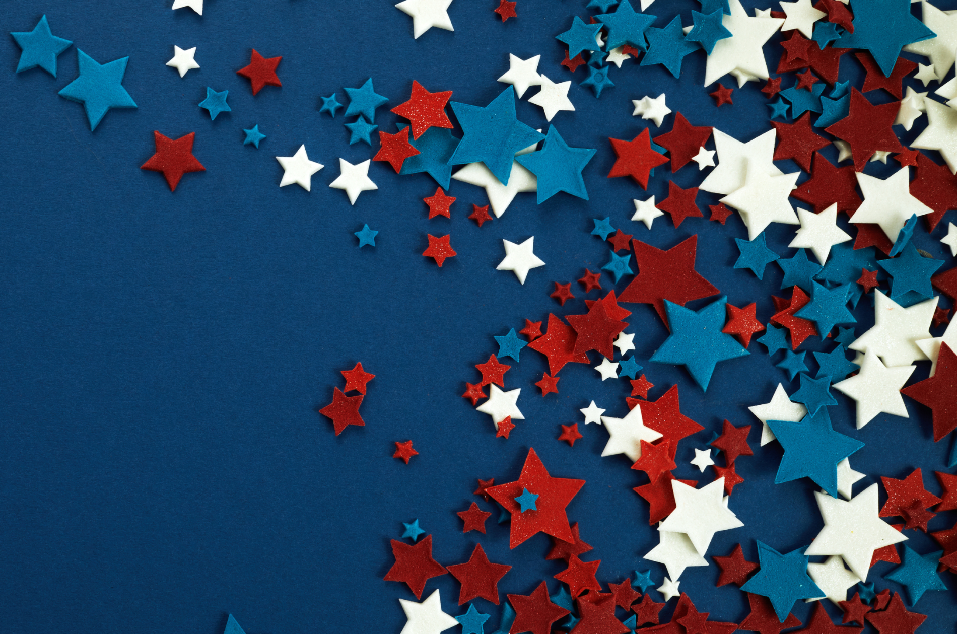 red, white and blue stars on a blue background